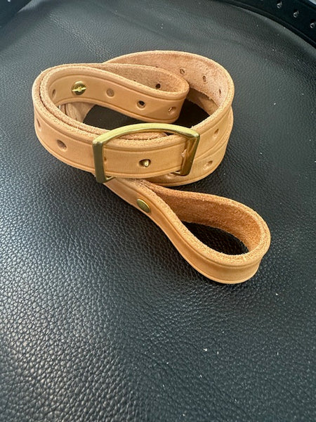 Oiled tan two point slings with brass hardware 9/10 oz leather