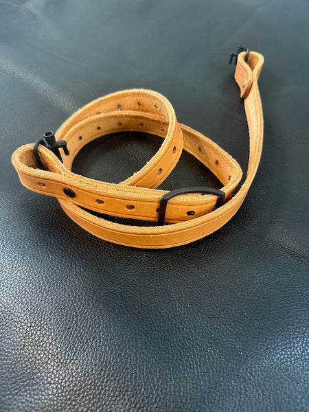 Oiled tan 2-point sling with black hardware and swivels (one left)